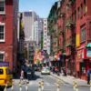 Busy daytime street scene in Chinatown, New York City with pedestrians, shops, and taxis., tags: seoul north - pexel